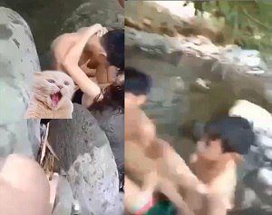 กลุ่มคนหนุ่มสาวที่แสดงความหลงใหลในลำธาร